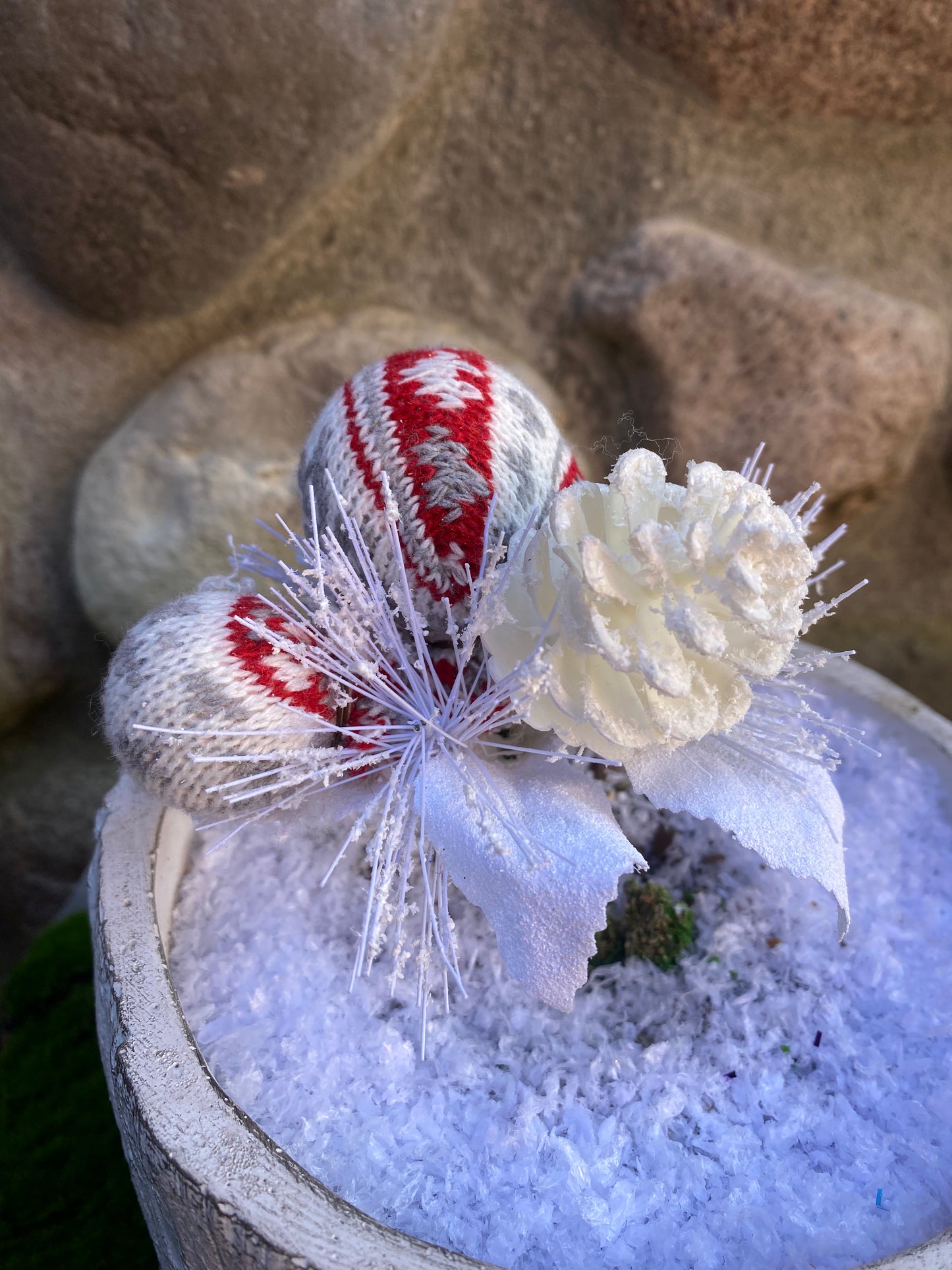 Red and White Fabric Balls With White Poinsettias